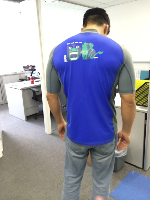 Back of the blue-and-grey SEEK Asia Dragon Boat uniform, with dragon artwork